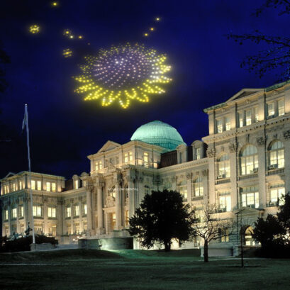 Drones create an image of a sunflower over mertz library