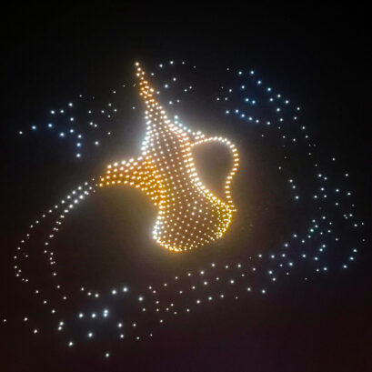 desert dreams drone show, a tea kettle in drone art